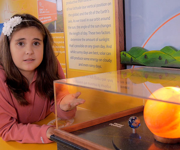 Close up of the Earth and Sun of the solar power display