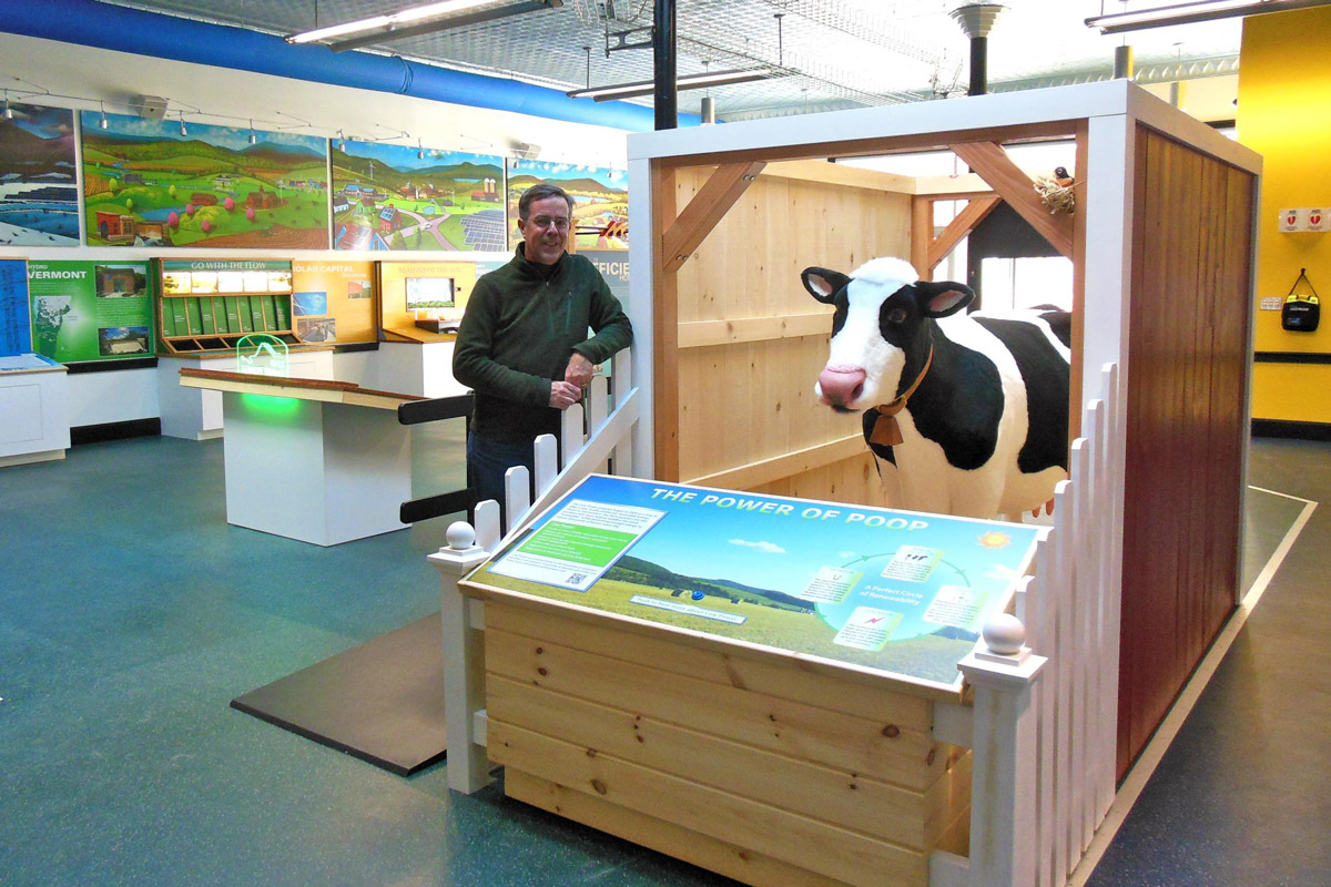 Green Mountain Power's Energy Innovation Center Cow Power exhibit featuring Electra, a life-sized animatronic talking Holstein.