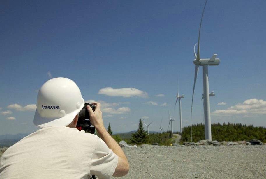 The Imagination Company's Jim Giberti filming the turbines at Kingdom Wind in Lowell, VT